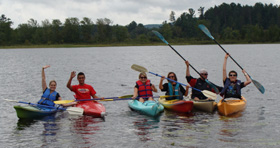 Group of kayakers on the bay